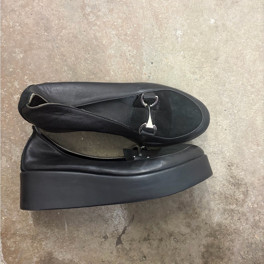 Platform loafers with horsebit details